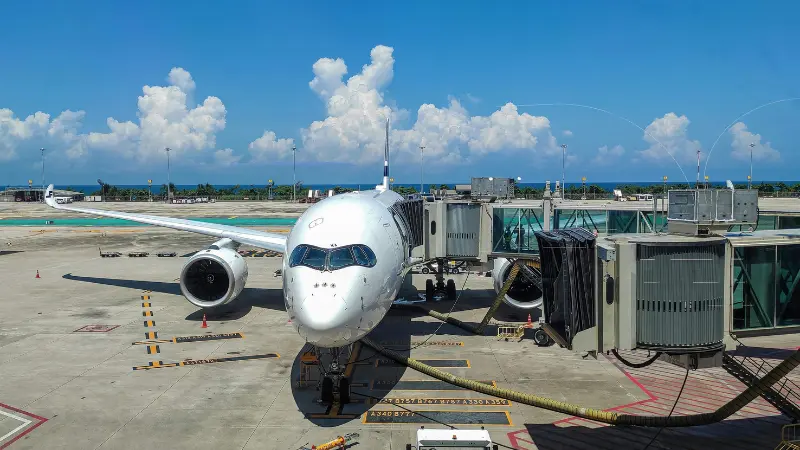 Airport runway with aircraft and ground vehicles illustrating LaGuardia runway collision environment
