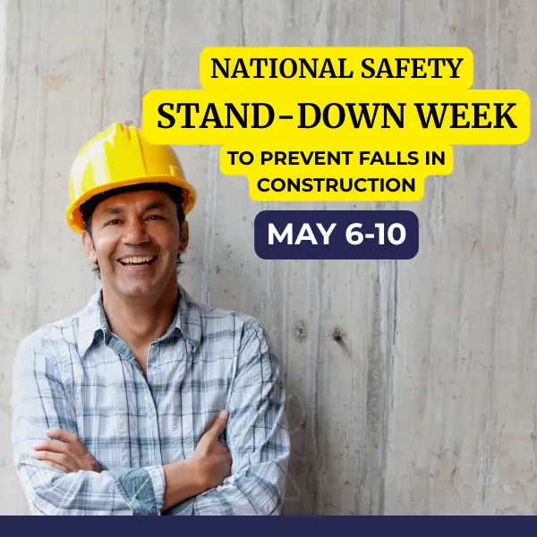 Smiling construction worker wearing a yellow hard hat and reflective vest, standing in front of a yellow background with the words “Fall Prevention Stand-Down Week” displayed in bold black text.