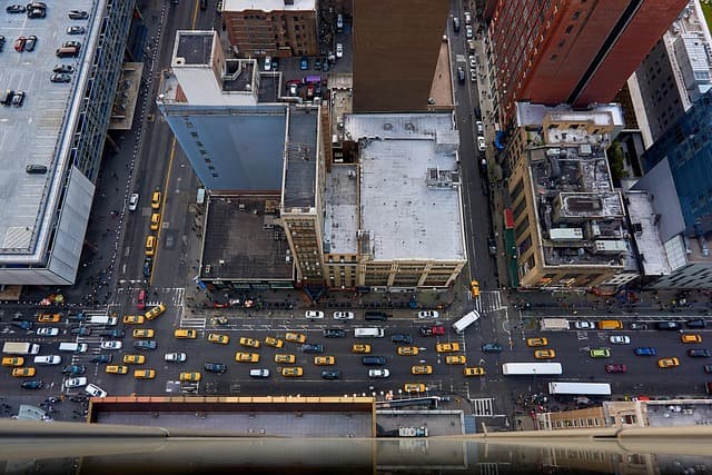 Aerial view of a busy New York City intersection with heavy traffic during NYC Traffic Accidents Fall 2025