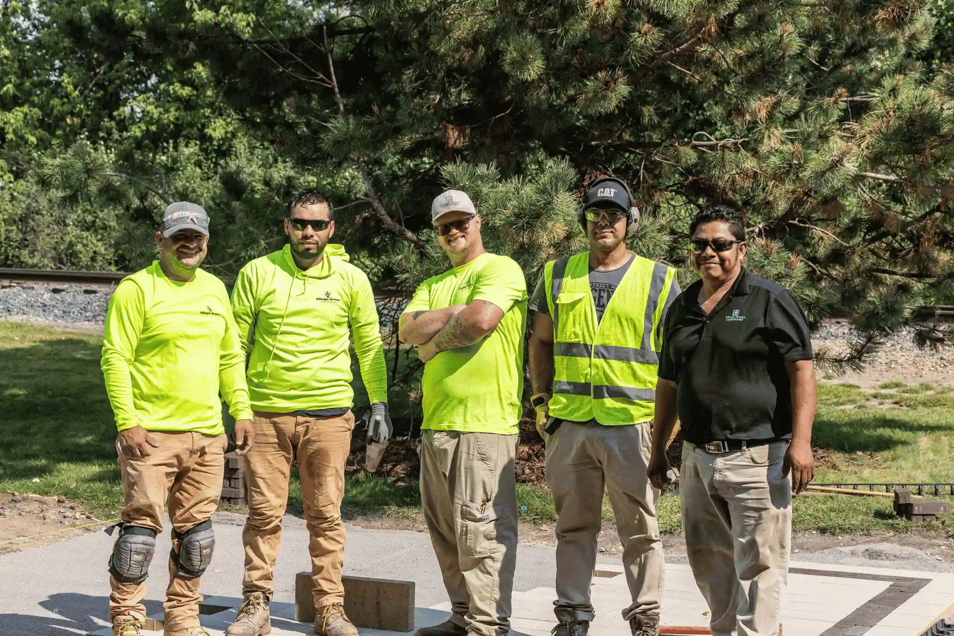 Landscaping company team at a completed project