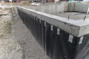Basement wall waterproofing membrane installed