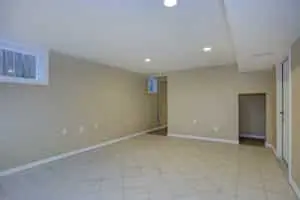 well lit basement with egress window 