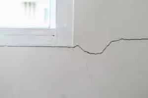 Wall crack near window seal.