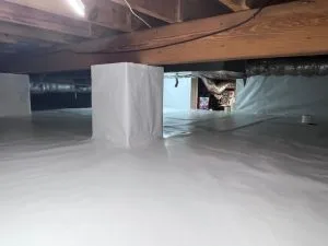 Crawl space encapsulation in Greenfield IN with sealed vapor barrier and clean waterproofed floor
