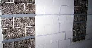 Bowed basement wall repair using carbon fiber reinforcement technology, highlighting structural integrity and foundation stabilization.