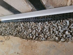 Interior Basement Drainage System Installation