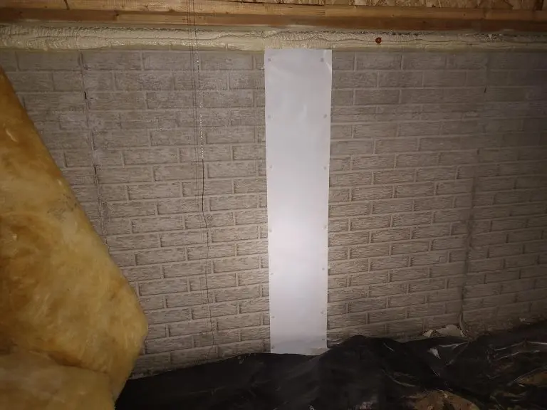 Structural urethane wall crack repair with Crack Shield installed on a crawl space foundation wall in Monclova, OH.