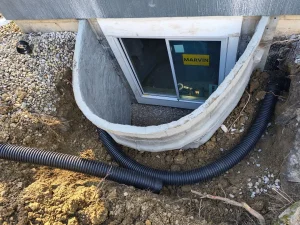 Composite egress window well and drainage installation at a Perrysburg, OH home