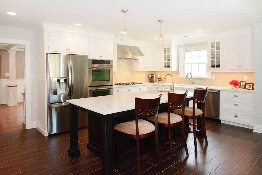 Luxury home addition on a classic North Jersey Colonial home with expanded kitchen and primary suite
