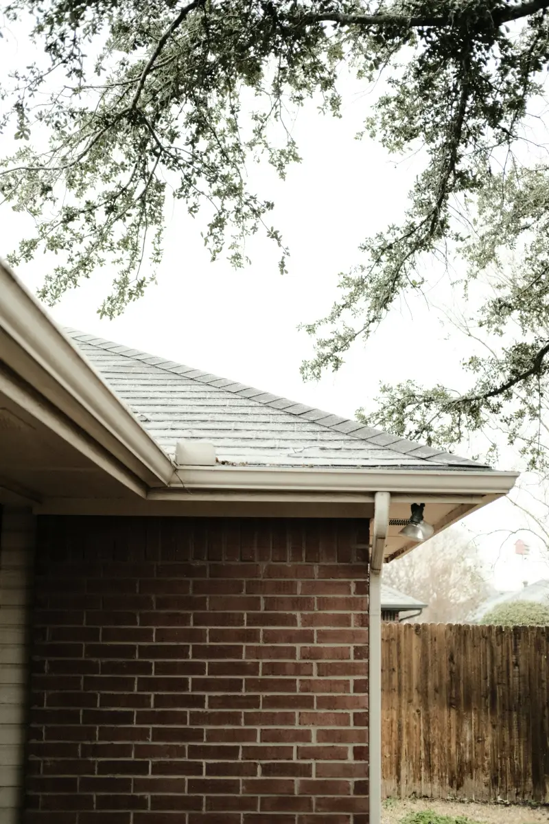 Gutter installation on a New Jersey home with roofline, gutter, and downspout