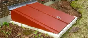 AquaGuard Waterproofing's BILCO basement entry door installation showcasing security and custom design options.