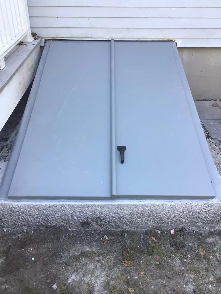Newly installed Bilco basement hatchway door providing waterproof protection in Madison CT