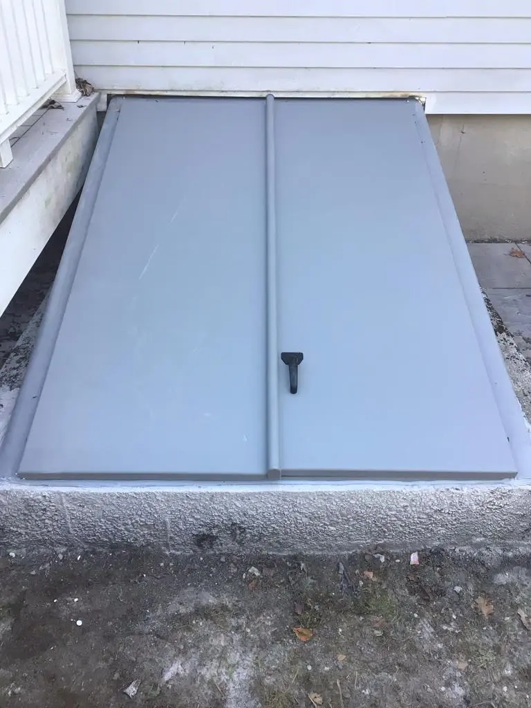 Newly installed Bilco basement hatchway door providing waterproof protection in Madison CT