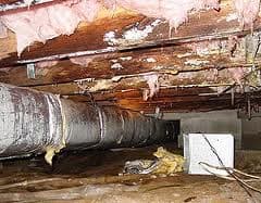 Conditioned crawlspace with vapor barrier protecting wooden floor joists from moisture and wood rot