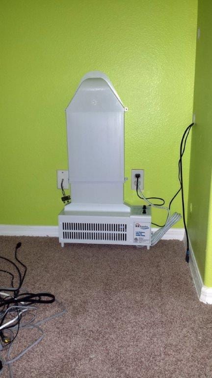 Ventilation system installed on wall in basement, promoting indoor air quality and moisture control for homeowners.