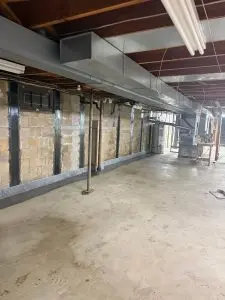 interior perimeter drain, dimpled drainage wall membrane