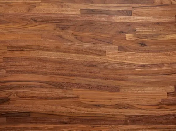 Cupping and warping hardwood floors showing moisture damage and potential subfloor issues.
