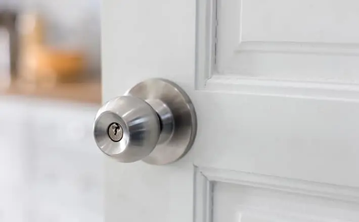 Sticking door and handle, a sign of potential foundation issues.