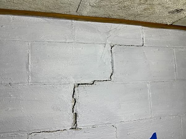 cinderblock wall with crack