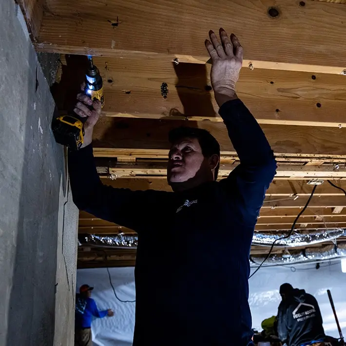Bouncing floor repair using crawl space stabilizers