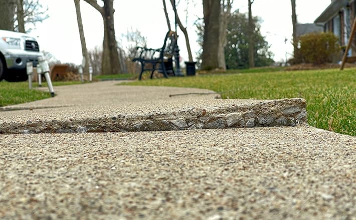 Uneven concrete sidewalk