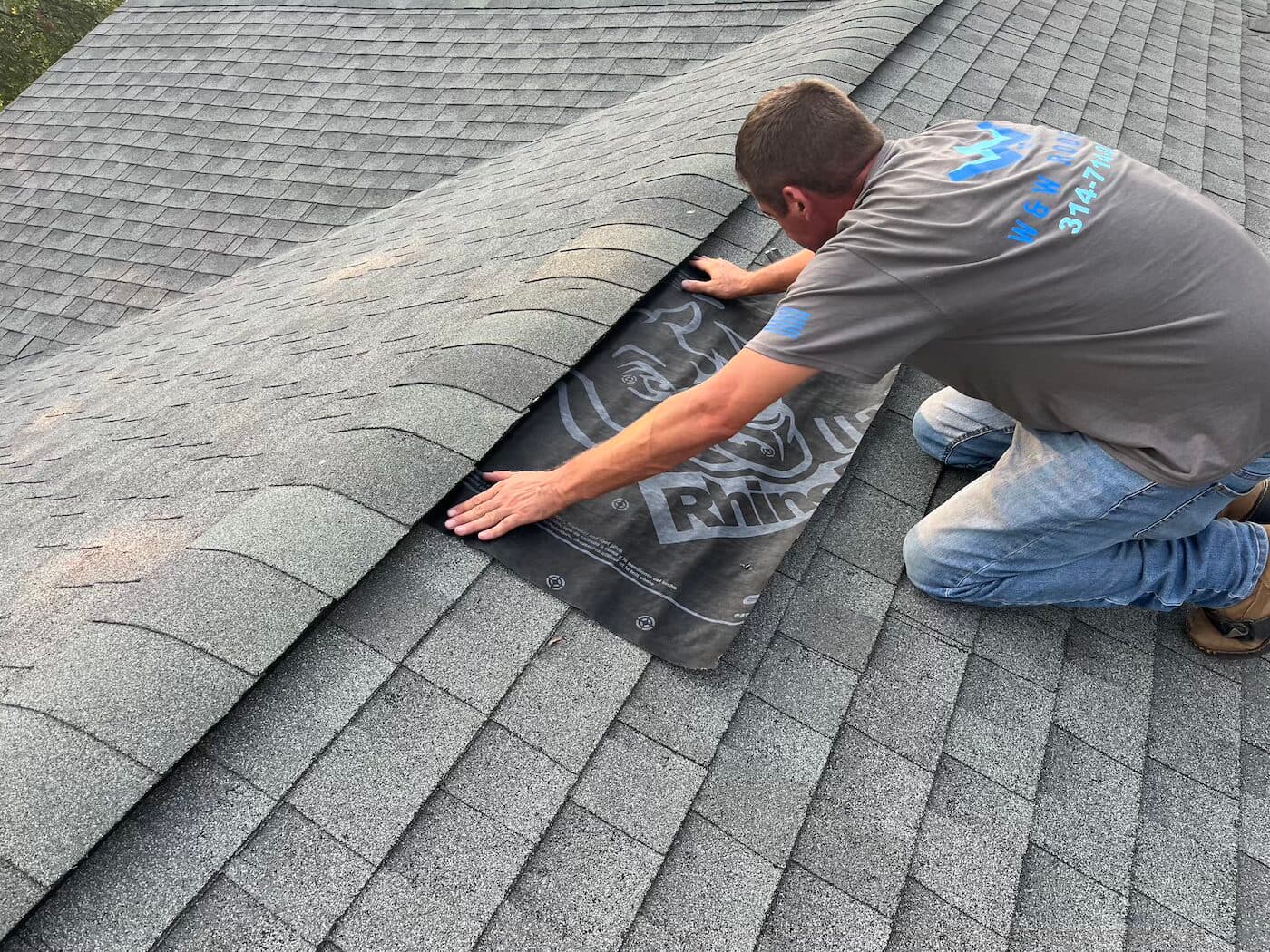 roofer placing underlayment