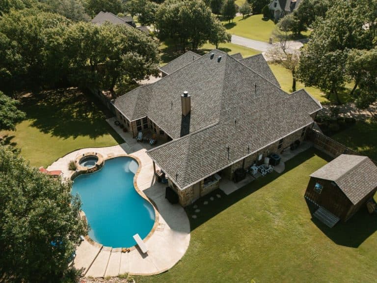 Aerial view of a house with a new roof