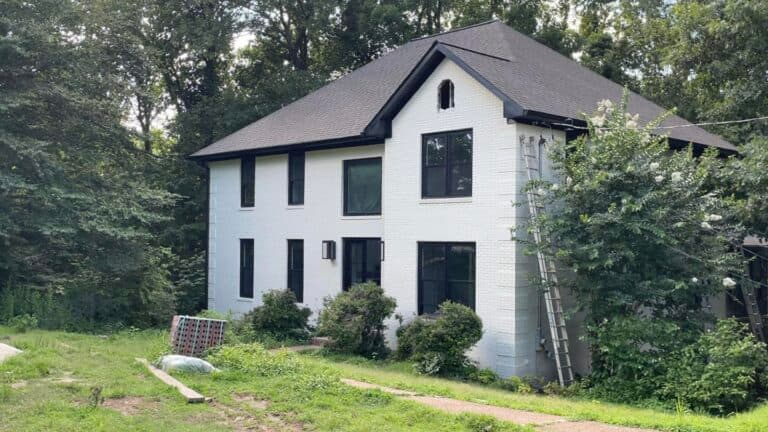 A white house with a newly renovated exterior