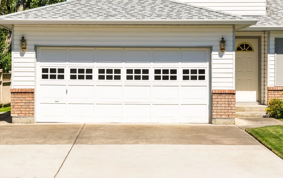 white garage door with door