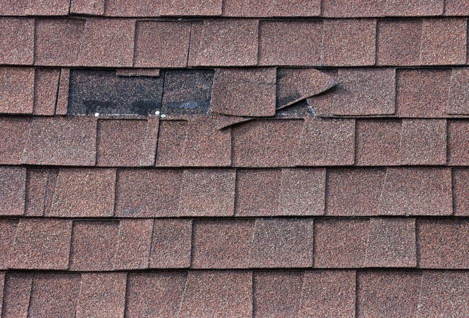 Two Shingles Missing from Mansard Roof