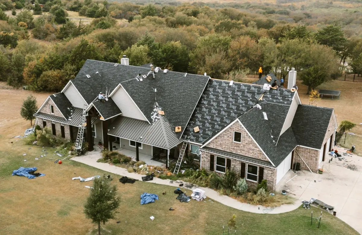 A roof being replaced by MINT Exteriors