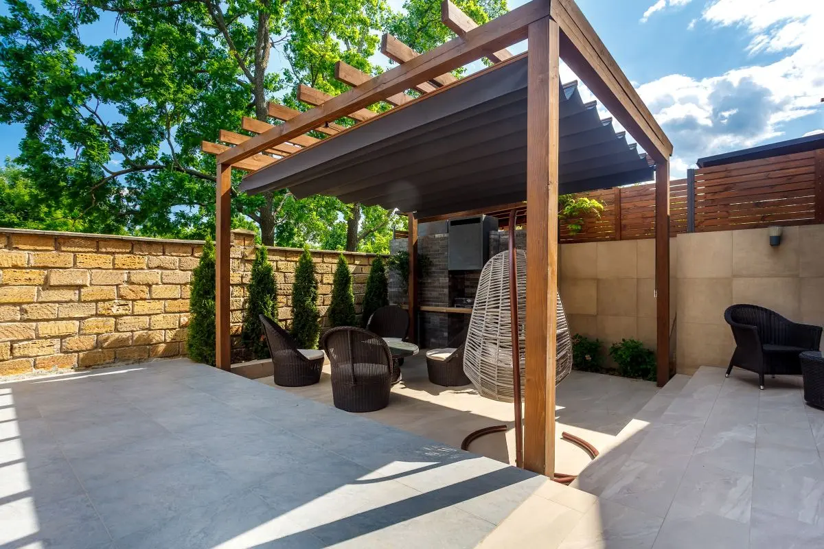 Backyard outdoor bbq zone with pergola