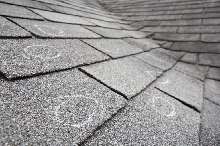 small holes on shingles roof after hail damage hail damage roof repair