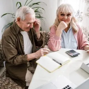 daughter explaining financial information to father