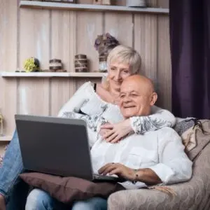 Elderly parents writing out their wishes