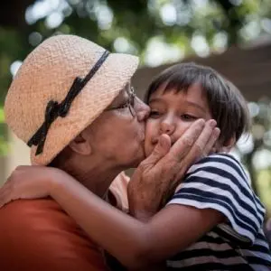 elderly parent with grandchild