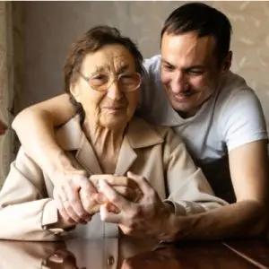 son caring for elderly mother