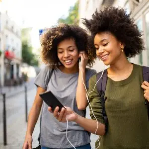 girls listening to podcast