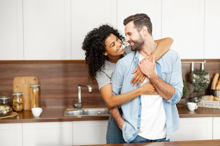 A happy couple shares affection for each other thanks to marriage counseling