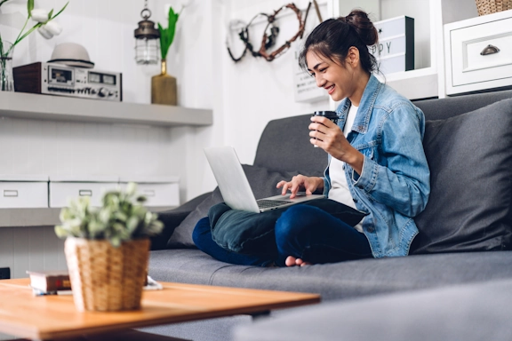 A woman speaks to her therapist during an online therapy session
