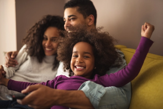 A family watches a movie together