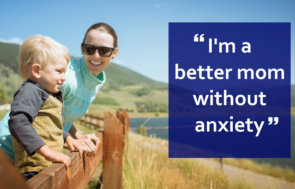 anxiety-mom A happy mom and her child look out over a Colorado lake