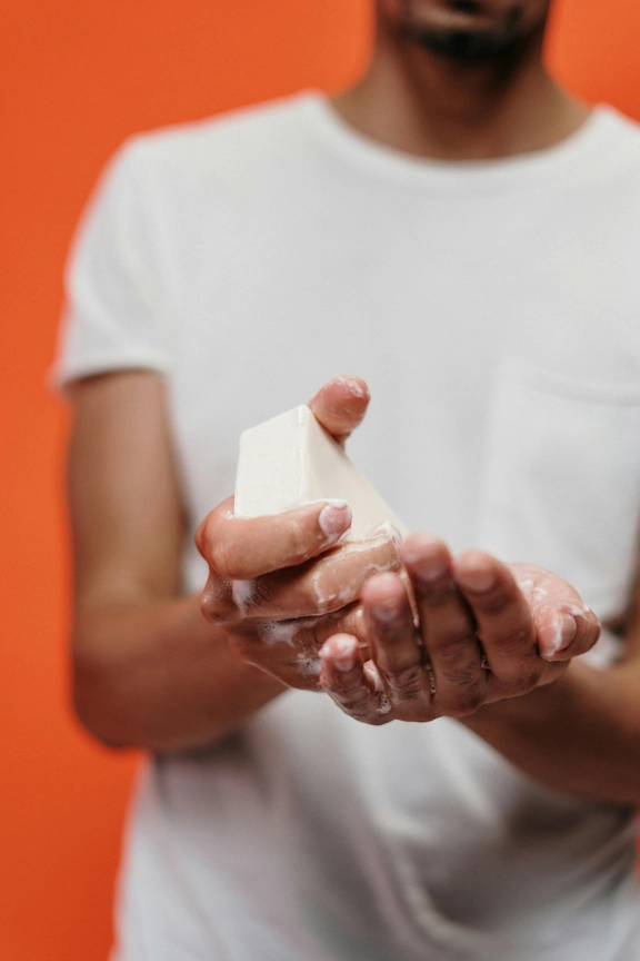 A man washes his hands repeatedly, a sign of OCD