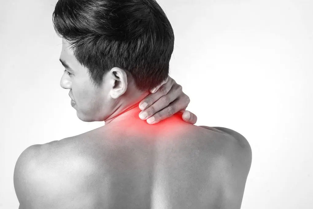 muscular-man-use-handles-neck-relieve-pain-isolated-white-background (1) Augusta Acupuncture Clinic | Top Neck Pain Doctor in Augusta