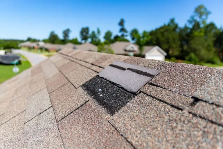 a missing shingle after storm damage in Wayzata, Minnesota