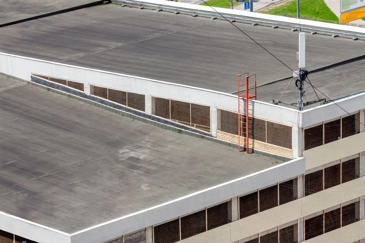 Flat roof top modern commercial building car garage exterior mixed-use urban multi-family residential area, Wayzata