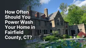 Stone home in Fairfield County with a swimming pool and the title “How Often Should You Power Wash Your Home in Fairfield County, CT?”