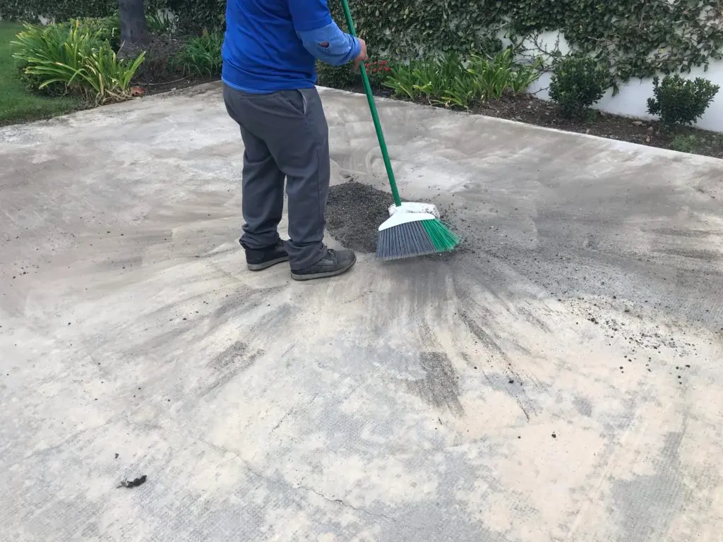 sweeping up construction debris