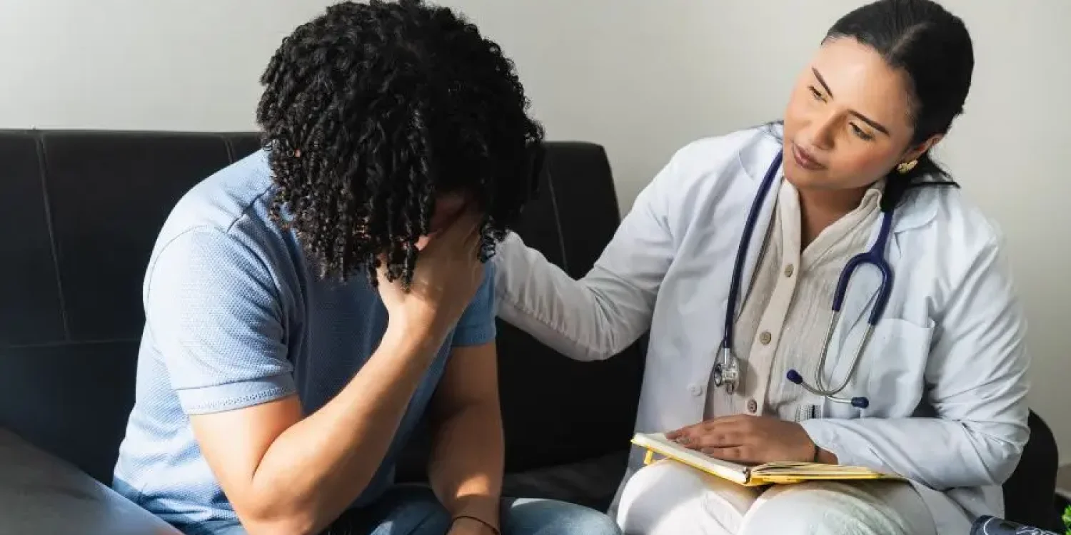 federal employee speaking with mental health provider about anxiety after a work injury