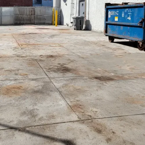 Rusty Concrete Dumpster Pad